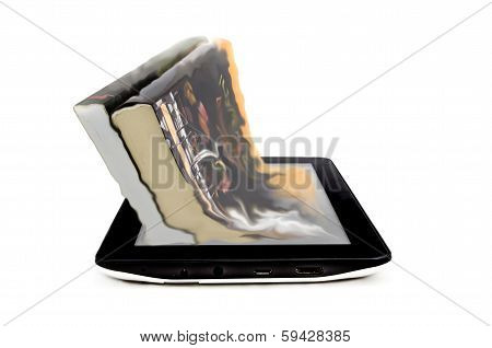 Book and tablet computer on a white background