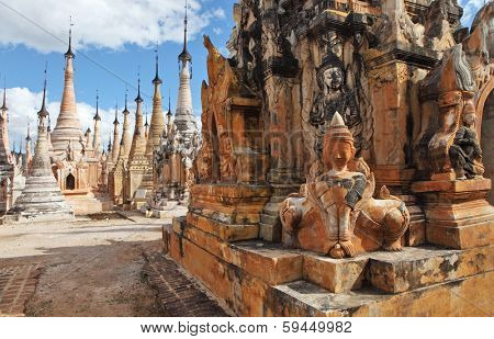 INDEIN, MYANMAR - DEC 12, 2013 Pagodas with statute and bas-relief of Indein, Inle Lake, Myanmar 