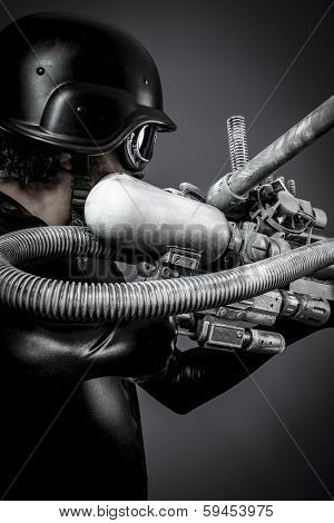 Mech.Starfighter with huge plasma rifle, fantasy concept, military helmet and goggles motorcyclist