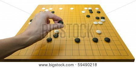 Hand Placing Go Stone