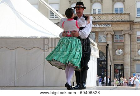 ZAGREB, CROATIA - JULY 19: Members of folk groups Nograd  from Salgotarjan, Hungary during the 48th International Folklore Festival in center of Zagreb, Croatia on July 19, 2014
