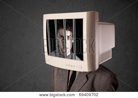 Business man with monitor screen on his head traped into a digital system concept