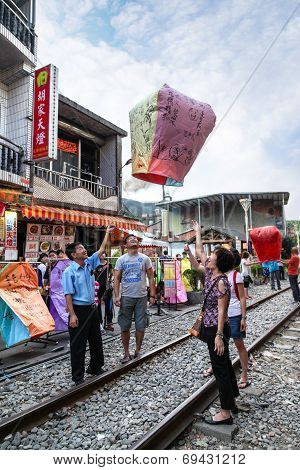 Releasing A Paper Sky Lantern