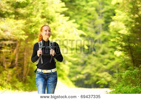Happy girl in the forest