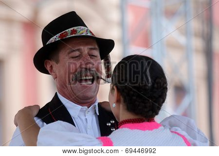 ZAGREB, CROATIA - JULY 19: Members of folk groups Nograd  from Salgotarjan, Hungary during the 48th International Folklore Festival in center of Zagreb, Croatia on July 19, 2014