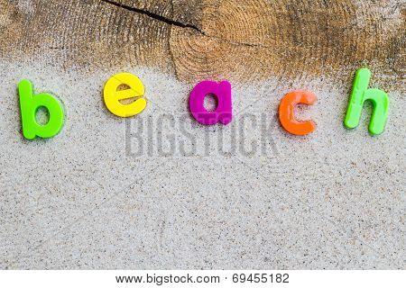 The Word Beach Laid Sand