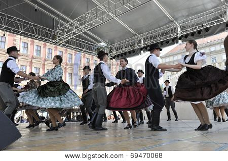 ZAGREB, CROATIA - JULY 19: Members of folk groups Nograd  from Salgotarjan, Hungary during the 48th International Folklore Festival in center of Zagreb, Croatia on July 19, 2014