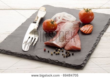 Pink Herring With Vegetable On Slate