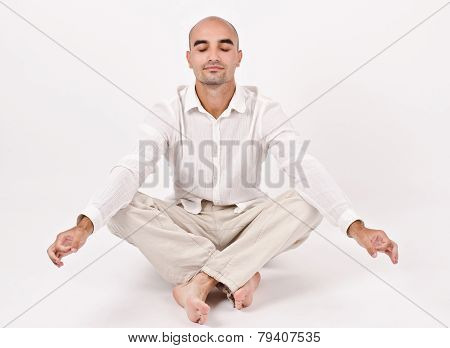 Man in yoga position.
