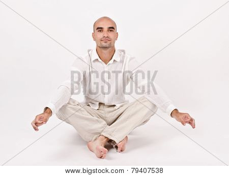 Man in yoga position.