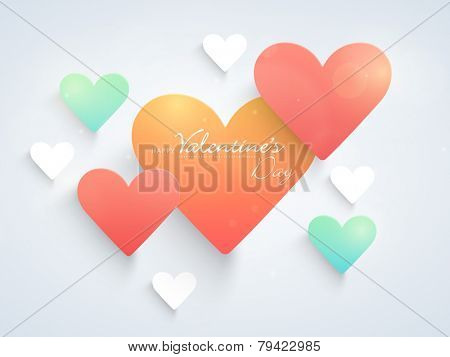 Shiny romantic colorful love hearts for Happy Valentine's Day celebration on sky blue background.