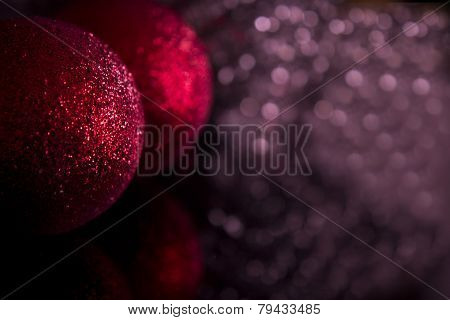 Christmas Baubles Decoration On Defocused Lights Background