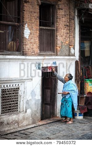 Woman Doing Ritual In Nepal