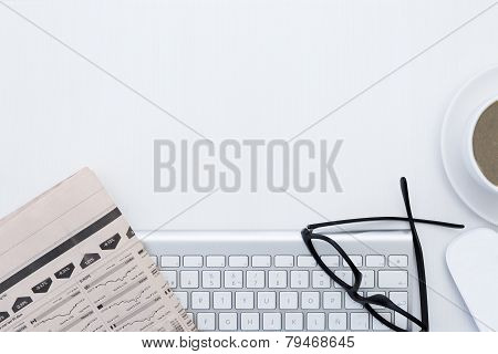 Business Desk And A Wireless Silvery Keyboard