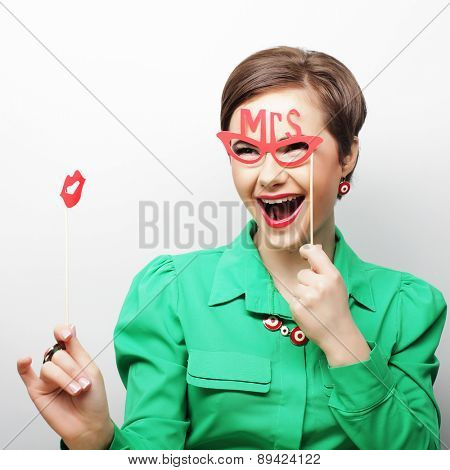 Attractive playful young woman ready for party - falce lips and glasses   