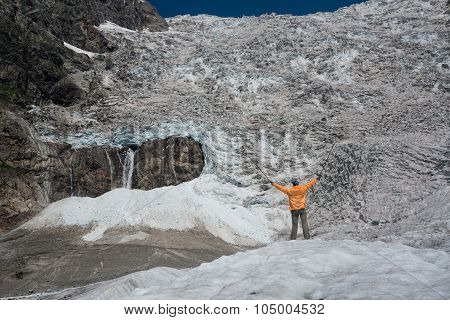 Tourist Looks At Icefall