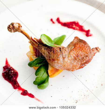 Roasted partridge, chicken thigh with salad