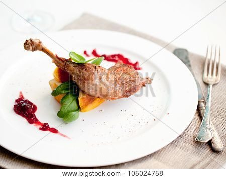 Roasted partridge, chicken thigh with salad