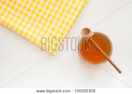 Golden Honey In A Glass From Above - Studio Shot