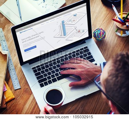 Bangkok, Thailand - October 14, 2015: Man on a Computer Browsing Dropbox Website