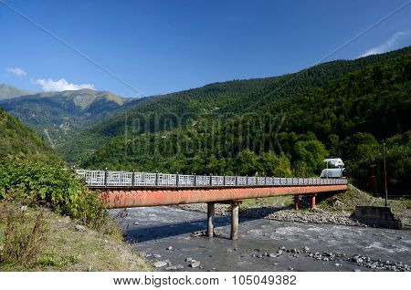 Small Bridge Over Mountain River In Upper Svaneti, Georgia,transcaucasia