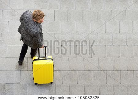 Travel Man Walking With Suitcase
