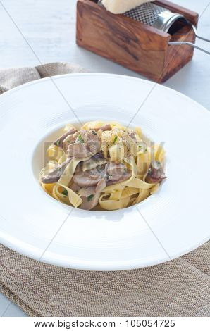 .pasta And Rice With Porcini Mushrooms Served With Butter And Parmesan