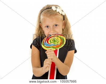Beautiful Female Child With Long Blond Hair Eating Licking Huge Spiral Lollipop Candy Smiling Happy