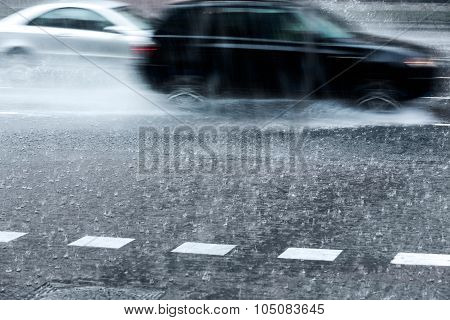 Blurred Cars In Torrential Rain