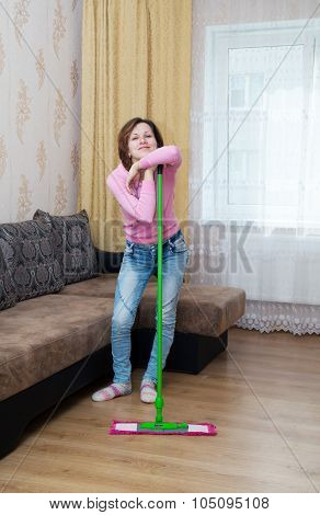 Young Brunette Woman Standing With Mop