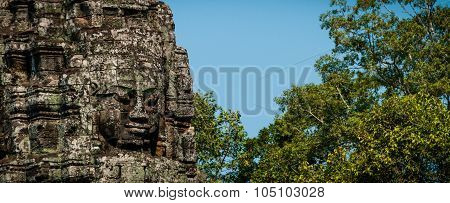 Head encarved in stone Bayon temple angkor