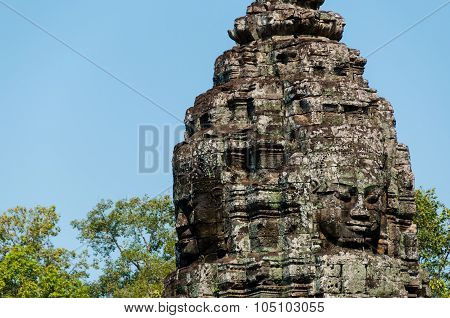 Head encarved in stone Bayon temple angkor