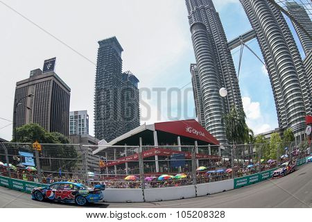 KUALA LUMPUR, MALAYSIA - AUGUST 09, 2015: Chaz Mostert from the Pepsi Max Crew team races in the V8 Supercars Street Challenge at the 2015 Kuala Lumpur City Grand Prix.