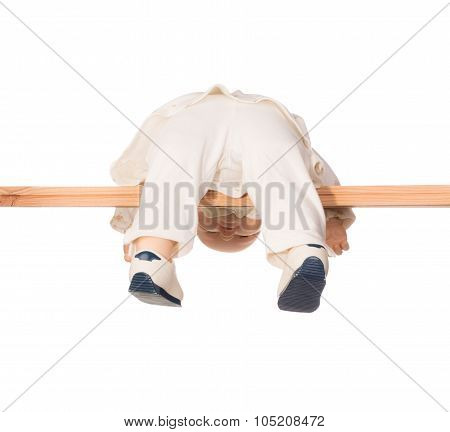 Baby doll on a crossbar