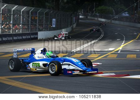 KUALA LUMPUR, MALAYSIA - AUGUST 09, 2015: Nicholas Rowe in a single seater racing car race in the city street circuit in the Formula Masters China Series Race at the 2015 Kuala Lumpur City Grand Prix.