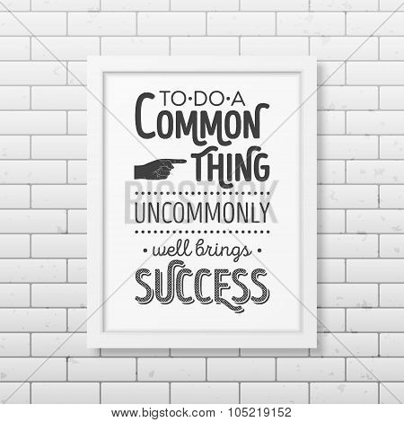 Quote typographical Background in realistic square white frame on the brick wall background