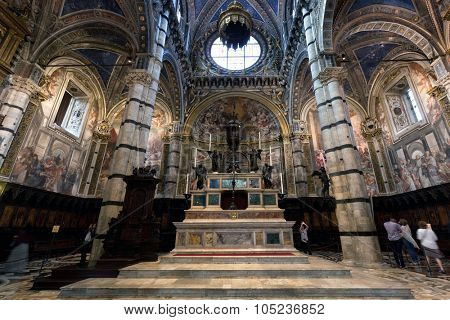 SIENA, ITALY - October 10, 2015: Interior of Siena Cathedral, Italian Duomo di Siena, Santa Maria Assunta. The 13th century church with its mosaic floor is a major tourism attraction in Siena, Italy 