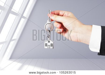 Hand With Keys From The New Housing