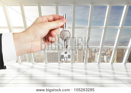Hand With Keys From The New Loft Apartments
