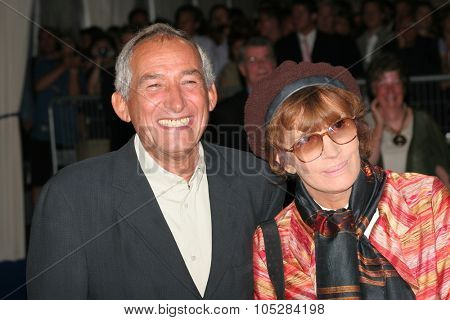 DEAUVILLE, FRANCE - SEPTEMBER 02: Alain Corneau and Nadine Trintignant arrive at  the 31st annual Deauville Film Festival where the movie 'The Matador'  on September 2, 2005 in Deauville, France.