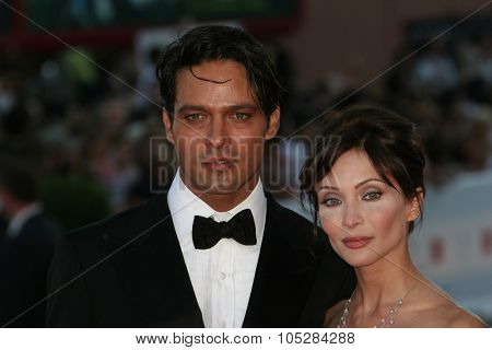 VENICE, ITALY - AUGUST 27: Actors Gabriel Garko  Isabella Orsini arrive at the opening ceremony and 'Burn After Reading'  during the 65th Venice Film Festival  on August 27, 2008 in Venice, Italy.