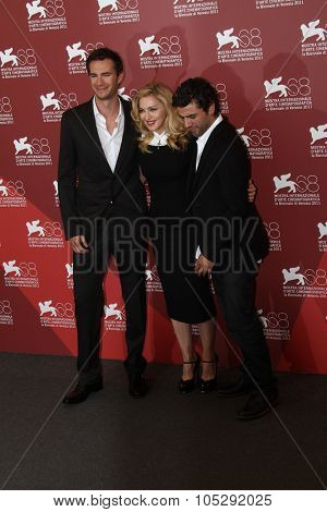 VENICE, ITALY - SEPTEMBER 01:  James DâArcy, director/writer Madonna and actor Oscar Isaac attend the 'W.E.' Photocall during the 68th Venice  Film Festival  on September 1, 2011 in Venice, Italy