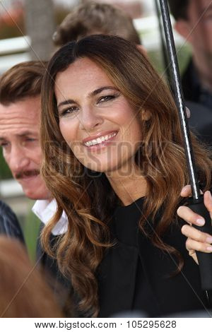 CANNES, FRANCE - MAY 18: Sean Penn, Roberta Armani  pose at the 'Haiti Carnaval In Cannes' photocall during the 65th Annual Cannes Film Festival on May 18, 2012 in Cannes, France.