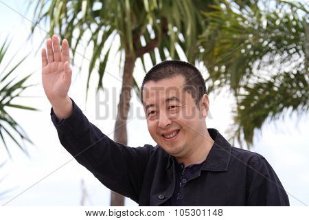 CANNES, FRANCE - MAY 17: Director Jia Zhangke attends 'Tian Zhu Ding' (A Touch Of Sin) photocall during the 66th Cannes Film Festival at the Palais des Festivals on May 17, 2013 in Cannes, France.