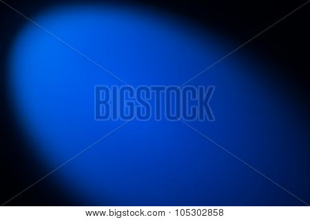 Black and blue background lighted with snoot