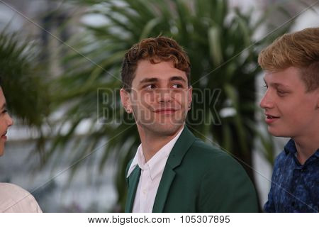 CANNES, FRANCE - MAY 22: Director Xavier Dolan attends the 'Mommy' photocall during the 67th Annual Cannes Film Festival on May 22, 2014 in Cannes, France.