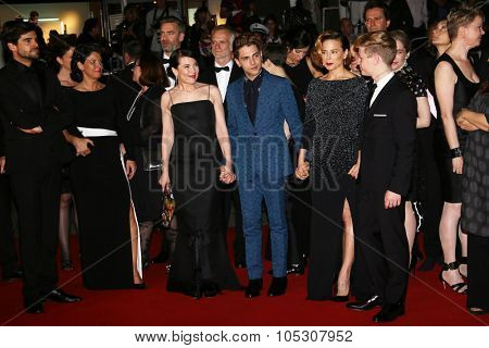 CANNES, FRANCE - MAY 22: Anne Dorval, director Xavier Dolan, actor Olivier Pilon and Suzanne Clement attend the 'Mommy' premiere during the 67th  Cannes Film Festival on May 22, 2014 in Cannes, France