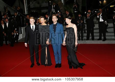 CANNES, FRANCE - MAY 22: Anne Dorval, director Xavier Dolan, actor Olivier Pilon and Suzanne Clement attend the 'Mommy' premiere during the 67th  Cannes Film Festival on May 22, 2014 in Cannes, France