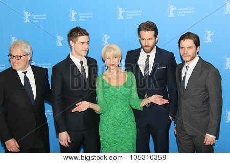 BERLIN, GERMANY - FEBRUARY 09: Helen Mirren, Ryan Reynolds, Daniel Bruehl attend the 'Woman in Gold' photocall during the 65th Berlinale Festival at Hyatt Hotel on February 9, 2015 in Berlin, Germany.