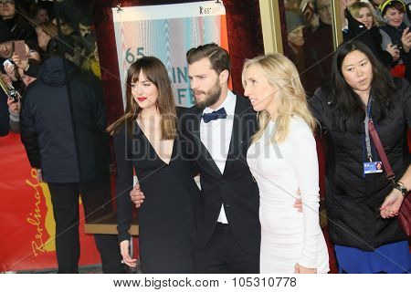 BERLIN, GERMANY - FEBRUARY 11: Jamie Dornan, Dakota Johnson  attend the 'Fifty Shades of Grey' premiere during the 65th Berlinale Film Festival at Zoo Palast on February 11, 2015 in Berlin, Germany.